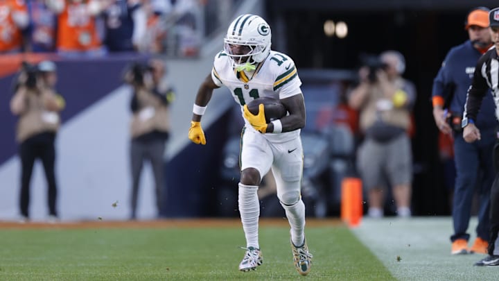 Dec 14, 2025; Denver, Colorado, USA; Green Bay Packers wide receiver Jayden Reed (11) runs for a gain during the second quarter against the Denver Broncos at Empower Field at Mile High. Mandatory Credit: Isaiah J. Downing-Imagn Images Dec 14, 2025; Denver, Colorado, USA; Green Bay Packers wide receiver Jayden Reed (11) runs for a gain during the second quarter against the Denver Broncos at Empower Field at Mile High. Mandatory Credit: Isaiah J. Downing-Imagn Images