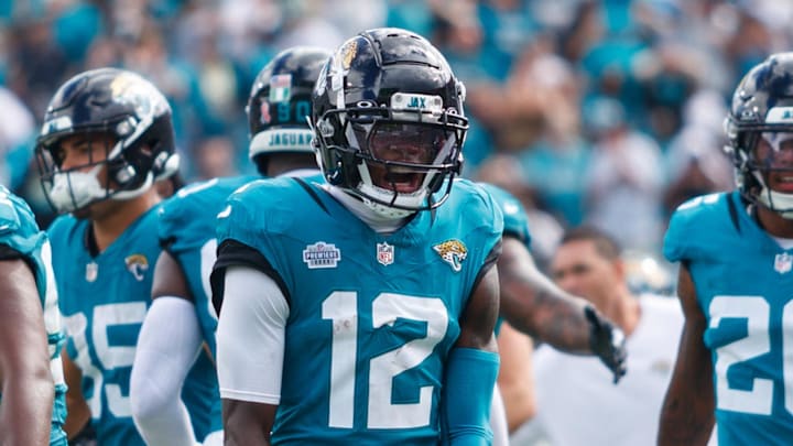 Sep 7, 2025; Jacksonville, Florida, USA; Jacksonville Jaguars wide receiver Travis Hunter (12) reacts after a turnover on defense against the Carolina Panthers during the third quarter at EverBank Stadium. Mandatory Credit: Morgan Tencza-Imagn Images
