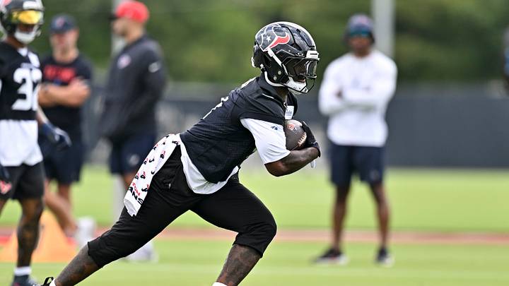 Jun 9, 2026; Houston, Texas, USA; Houston Texans running back Woody Marks participates in a drill during the team’s minicamp at Houston Methodist Training Center. Mandatory Credit: Maria Lysaker-Imagn Images Jun 9, 2026; Houston, Texas, USA; Houston Texans running back Woody Marks participates in a drill during the team’s minicamp at Houston Methodist Training Center. Mandatory Credit: Maria Lysaker-Imagn Images