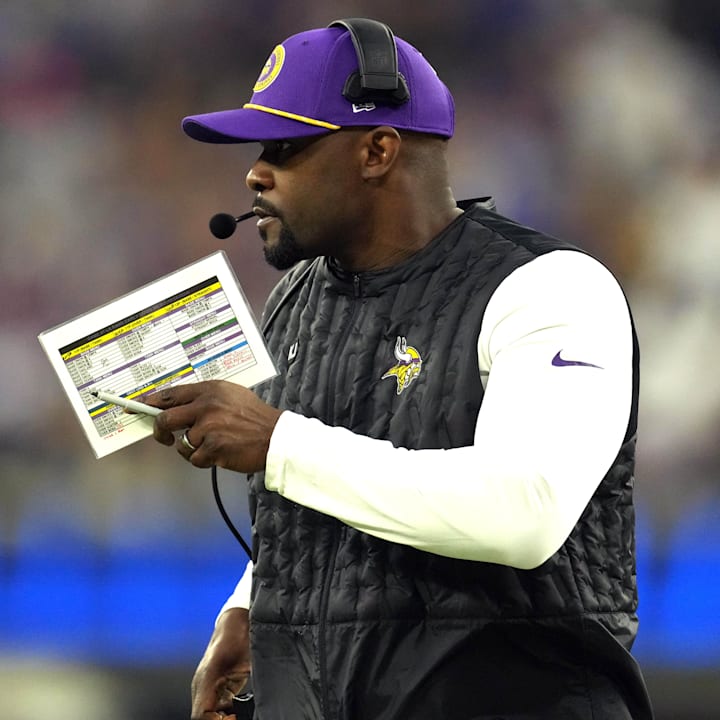 Minnesota Vikings defensive coordinator Brian Flores watches from the sidelines against the Los Angeles Rams.