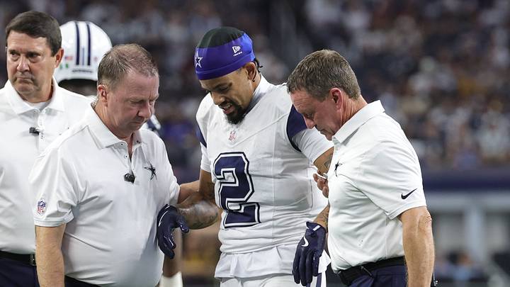 Dallas Cowboys cornerback Cobie Durant walks off the field with an injury against the Washington Commanders at AT&T Stadium. Dallas Cowboys cornerback Cobie Durant walks off the field with an injury against the Washington Commanders at AT&T Stadium.