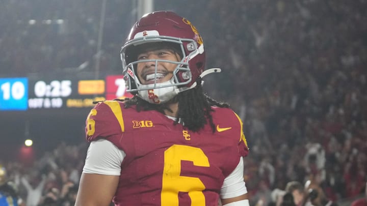 Nov 29, 2025; Los Angeles, California, USA; Southern California Trojans wide receiver Makai Lemon (6) celebrates after catching a 32-yard touchdown pass against the UCLA Bruins in the second half at United Airlines Field at Los Angeles Memorial Coliseum. Mandatory Credit: Kirby Lee-Imagn Images Nov 29, 2025; Los Angeles, California, USA; Southern California Trojans wide receiver Makai Lemon (6) celebrates after catching a 32-yard touchdown pass against the UCLA Bruins in the second half at United Airlines Field at Los Angeles Memorial Coliseum. Mandatory Credit: Kirby Lee-Imagn Images
