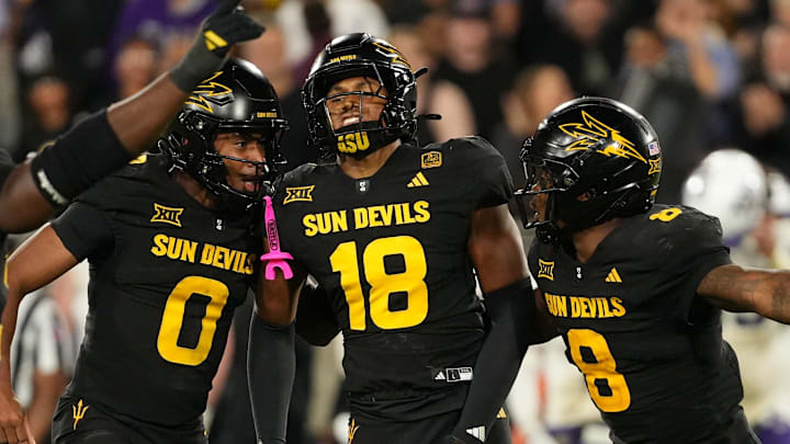Sep 26, 2025; Tempe, Arizona, USA; Arizona State Sun Devils linebacker Martell Hughes (18) celebrates a game-winning interception with defensive lineman Prince Dorbah (32), defensive back Rodney Bimage Jr. (0) and linebacker Jordan Crook (8) against TCU Horned Frogs in the second half at Mountain America Stadium, Home of the ASU Sun Devils. Mandatory Credit: Jacob Reiner-Imagn Images Sep 26, 2025; Tempe, Arizona, USA; Arizona State Sun Devils linebacker Martell Hughes (18) celebrates a game-winning interception with defensive lineman Prince Dorbah (32), defensive back Rodney Bimage Jr. (0) and linebacker Jordan Crook (8) against TCU Horned Frogs in the second half at Mountain America Stadium, Home of the ASU Sun Devils. Mandatory Credit: Jacob Reiner-Imagn Images
