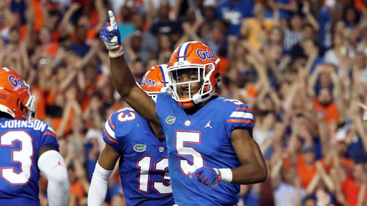Sep 8, 2018; Gainesville, FL, USA; Florida Gators defensive back CJ Henderson (5) celebrates as he intercepted the ball during the second quarter against the Kentucky Wildcats at Ben Hill Griffin Stadium. Mandatory Credit: Kim Klement-Imagn Images Sep 8, 2018; Gainesville, FL, USA; Florida Gators defensive back CJ Henderson (5) celebrates as he intercepted the ball during the second quarter against the Kentucky Wildcats at Ben Hill Griffin Stadium. Mandatory Credit: Kim Klement-Imagn Images