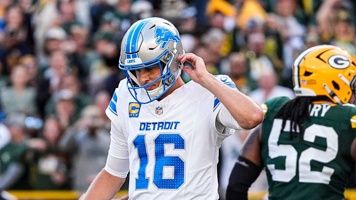 Detroit Lions quarterback Jared Goff walks off the field after a failed third-down conversion against the Green Bay Packers 