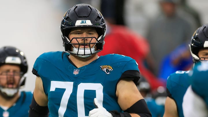Jacksonville Jaguars offensive tackle Cole Van Lanen (70) runs on the field before an NFL football matchup Sunday, Dec. 29, 2024 at EverBank Stadium in Jacksonville, Fla. The Jaguars held off the Titans 20-13. [Corey Perrine/Florida Times-Union]