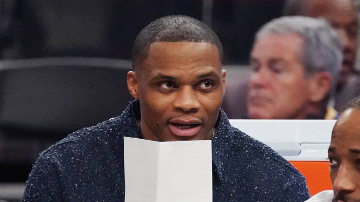 Apr 7, 2026; San Francisco, California, USA;  Sacramento Kings forward-guard De'Andre Hunter (15), guard Russell Westbrook (18), and guard-forward DeMar DeRozan (10), wearing an Azzi Fudd t-shirt, watch the action against the Golden State Warriors in the second quarter at Chase Center. Mandatory Credit: David Gonzales-Imagn Images