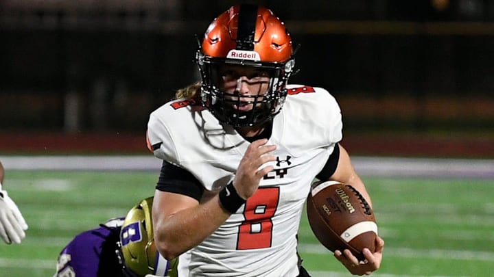Lely's quarterback Carter Quinn (8) on a keeper. The Booker Tornadoes hosted the Lely Trojans (Naples, FL) Friday night, Aug. 23, 2024, who lost to Booker 46-0 during the first regular non-conference season game of the year. Lely's quarterback Carter Quinn (8) on a keeper. The Booker Tornadoes hosted the Lely Trojans (Naples, FL) Friday night, Aug. 23, 2024, who lost to Booker 46-0 during the first regular non-conference season game of the year.