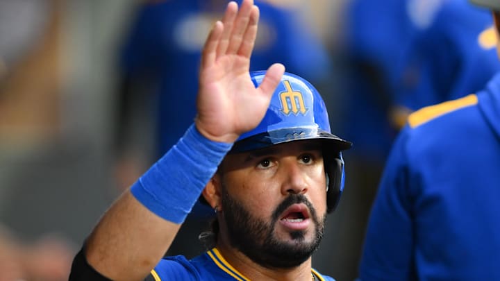 Seattle Mariners third baseman Eugenio Suarez celebrates after scoring a run against the Texas Rangers on July 31 at T-Mobile Park.