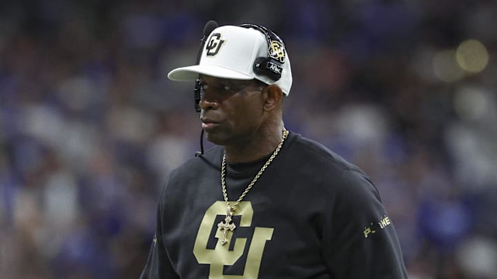 Dec 28, 2024; San Antonio, TX, USA; Colorado Buffaloes head coach Deion Sanders walks on the field during the game against the Brigham Young Cougars at Alamodome. Mandatory Credit: Troy Taormina-Imagn Images Dec 28, 2024; San Antonio, TX, USA; Colorado Buffaloes head coach Deion Sanders walks on the field during the game against the Brigham Young Cougars at Alamodome. Mandatory Credit: Troy Taormina-Imagn Images