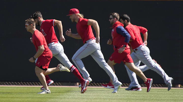 Angels pitcher Noah Syndergaard (M) runs during spring training camp on March 14, 2022.