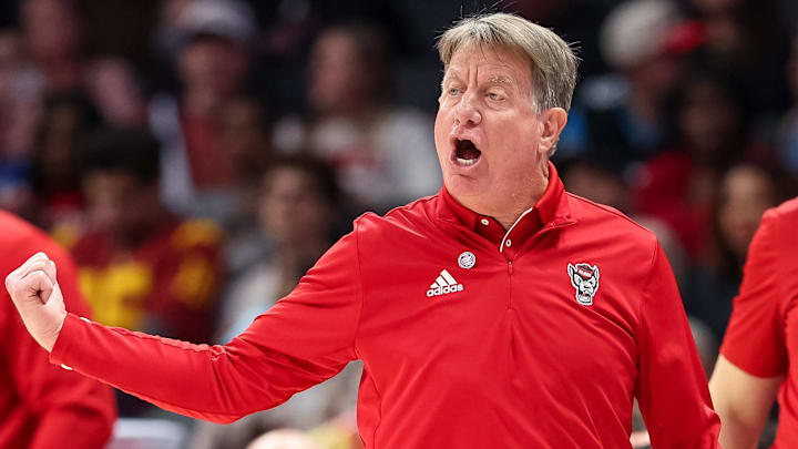 Nov 9, 2025; Charlotte, North Carolina, USA; NC State Wolfpack head coach Wes Moore in action against the Southern California Trojans during the fourth quarter of the Ally Tipoff game at Spectrum Center. Mandatory Credit: Cory Knowlton-Imagn Images