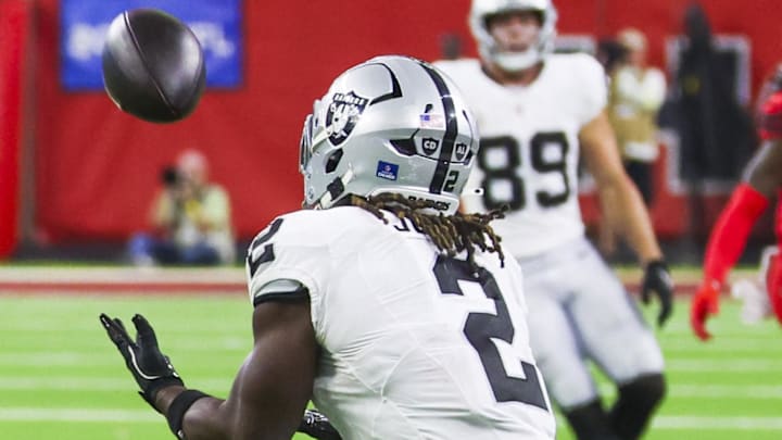 Dec 21, 2025; Houston, Texas, USA; Las Vegas Raiders running back Ashton Jeanty (2) catches a touchdown pass against the Houston Texans during the third quarter at NRG Stadium. Mandatory Credit: Thomas Shea-Imagn Images