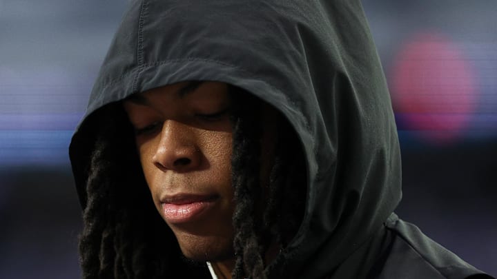 Detroit Lions running back Jahmyr Gibbs (0) looks on during warmups before the game against the Vikings
