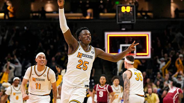 Jan 24, 2026; Columbia, Missouri, USA; Missouri Tigers forward Mark Mitchell (25) celebrates after a buzzer beater to defeat the Oklahoma Sooners in overtime at Mizzou Arena. Mandatory Credit: Jay Biggerstaff-Imagn Images