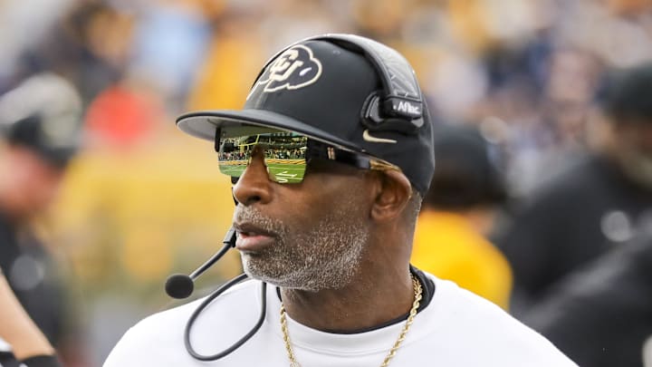 Nov 8, 2025; Morgantown, West Virginia, USA; Colorado Buffaloes head coach Deion Sanders walks along the sidelines late in the fourth quarter against the West Virginia Mountaineers at Milan Puskar Stadium. Mandatory Credit: Ben Queen-Imagn Images