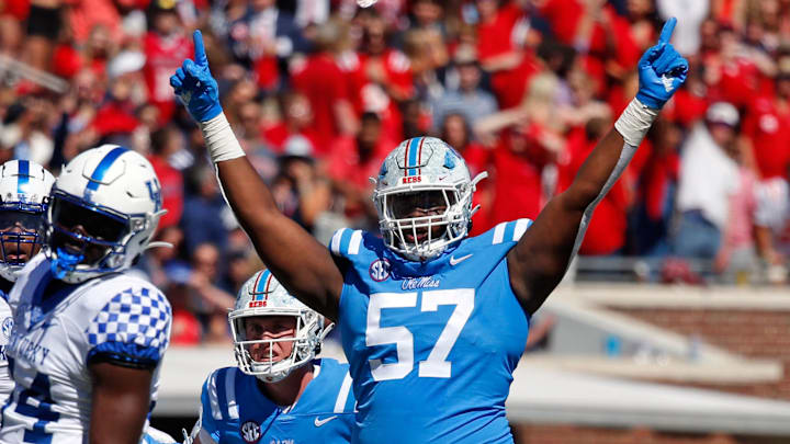 Oct 1, 2022; Oxford, Mississippi, USA; Mississippi Rebels offensive linemen Micah Pettus (57) reacts after a field goal during the first half against the Kentucky Wildcats at Vaught-Hemingway Stadium. Mandatory Credit: Petre Thomas-Imagn Images