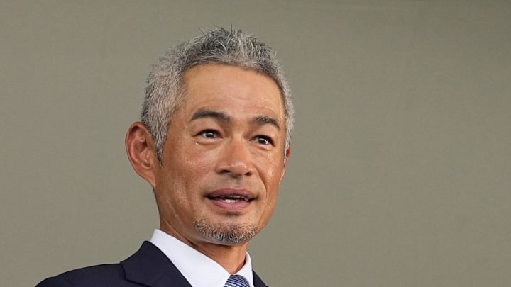 Ichiro Suzuki poses with his plaque after being induction in the National Baseball Hall of Fame on July 27 at Clark Sports Center in Cooperstown, N.Y.