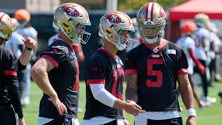 San Francisco 49ers quarterbacks Brock Purdy (13), Trey Lance (5) and Sam Darnold (14)
