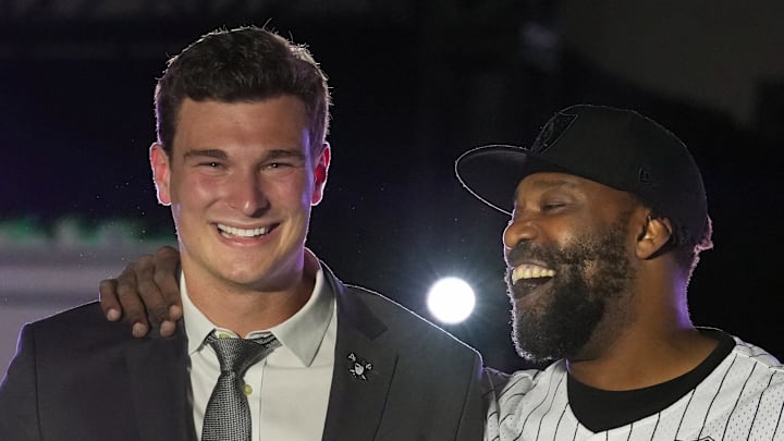 Apr 24, 2026; Henderson, NV, USA; Las Vegas Raiders quarterback Fernando Mendoza (left) with Louis Murphy at the Festival of Football at the Intermountain Health Performance Center. Mandatory Credit: Kirby Lee-Imagn Images
