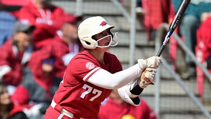 Arkansas' Bri Ellis at the plate against No. 1 Oklahoma as part of a two-homer day. The Sooners won 10-7. Arkansas' Bri Ellis at the plate against No. 1 Oklahoma as part of a two-homer day. The Sooners won 10-7.