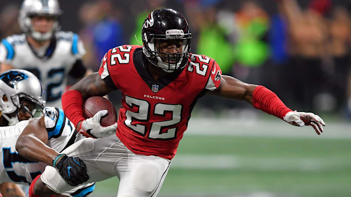 Dec 31, 2017; Atlanta, GA, USA; Atlanta Falcons safety Keanu Neal (22) is tackled by Carolina Panthers wide receiver Devin Funchess (17) after a pass interception during the second half at Mercedes-Benz Stadium. Mandatory Credit: Dale Zanine-Imagn Images