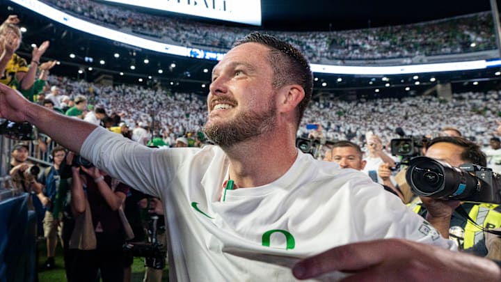 Oregon head coach Dan Lanning celebrates his win with Duck fans as the Oregon Ducks face the Penn State Nittany Lions on Sept. 27, 2025, at Beaver Stadium in University Park, Pennsylvania. Oregon head coach Dan Lanning celebrates his win with Duck fans as the Oregon Ducks face the Penn State Nittany Lions on Sept. 27, 2025, at Beaver Stadium in University Park, Pennsylvania.
