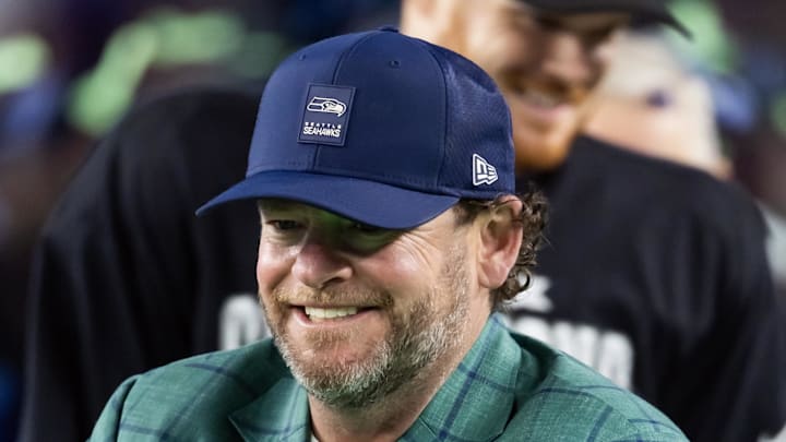 Seattle Seahawks general manager John Schneider celebrates with the Vince Lombardi trophy