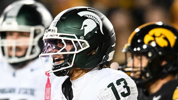 Nov 22, 2025; Iowa City, Iowa, USA; Michigan State Spartans wide receiver Chrishon McCray (13) reacts after a touchdown during the third quarter against the Iowa Hawkeyes at Kinnick Stadium. Mandatory Credit: Jeffrey Becker-Imagn Images