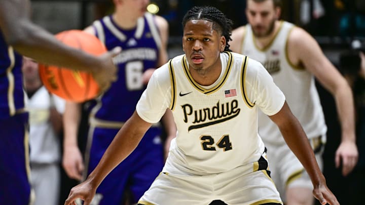 Purdue Boilermakers guard Gicarri Harris (24) defends against Washington Huskies guard Zoom Diallo (5) Purdue Boilermakers guard Gicarri Harris (24) defends against Washington Huskies guard Zoom Diallo (5)