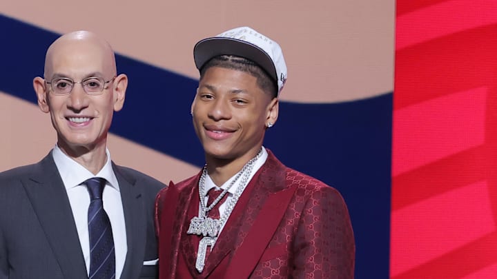 Jun 25, 2025; Brooklyn, NY, USA; Jeremiah Fears stands with NBA commissioner Adam Silver after being selected as the seventh pick by the New Orleans Pelicans in the first round of the 2025 NBA Draft at Barclays Center. Mandatory Credit: Brad Penner-Imagn Images Jun 25, 2025; Brooklyn, NY, USA; Jeremiah Fears stands with NBA commissioner Adam Silver after being selected as the seventh pick by the New Orleans Pelicans in the first round of the 2025 NBA Draft at Barclays Center. Mandatory Credit: Brad Penner-Imagn Images