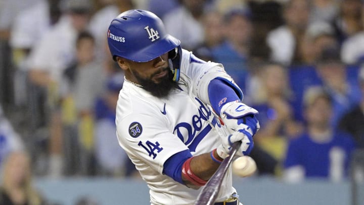 Oct 26, 2024; Los Angeles, California, USA; Los Angeles Dodgers outfielder Teoscar Hernandez (37) hits a two run home run in the third inning against the New York Yankees during game two of the 2024 MLB World Series at Dodger Stadium. Mandatory Credit: Jayne Kamin-Oncea-Imagn Images