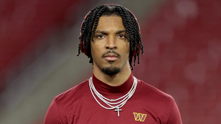 Jan 12, 2025; Tampa, Florida, USA; Washington Commanders quarterback Jayden Daniels (5) warms up before a NFC wild card playoff against the Tampa Bay Buccaneers at Raymond James Stadium. Mandatory Credit: Nathan Ray Seebeck-Imagn Images Jan 12, 2025; Tampa, Florida, USA; Washington Commanders quarterback Jayden Daniels (5) warms up before a NFC wild card playoff against the Tampa Bay Buccaneers at Raymond James Stadium. Mandatory Credit: Nathan Ray Seebeck-Imagn Images