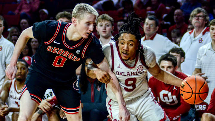Oklahoma guard Nijel Pack dribbles against Georgia's Blue Cain.