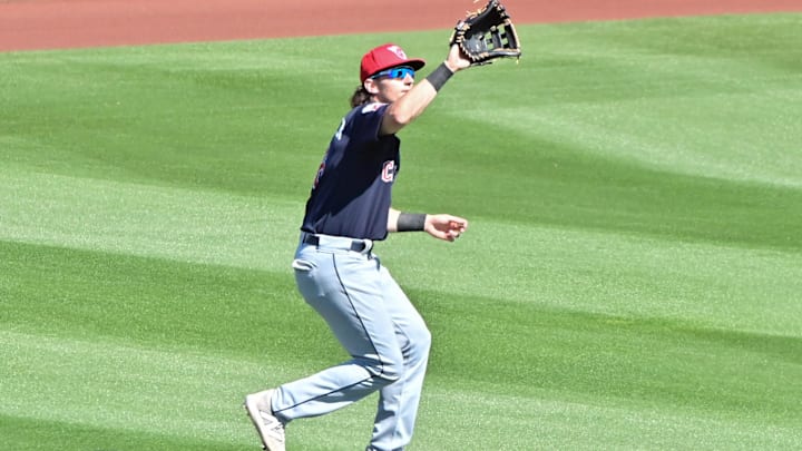 Feb 29, 2024; Tempe, Arizona, USA;  Cleveland Guardians right fielder Chase DeLauter (6) catches a fly ball in the third inning against the Los Angeles Angels during a spring training game at Tempe Diablo Stadium. Mandatory Credit: Matt Kartozian-Imagn Images