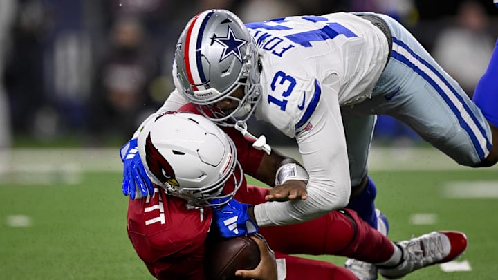 Nov 3, 2025; Arlington, Texas, USA; Dallas Cowboys defensive end Dante Fowler Jr. (13) sacks Arizona Cardinals quarterback Jacoby Brissett (7) during the game between the Dallas Cowboys and the Arizona Cardinals at AT&T Stadium. Mandatory Credit: Jerome Miron-Imagn Images