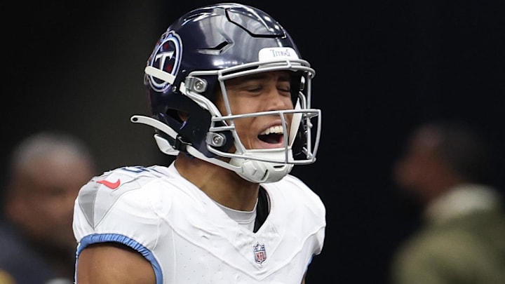Nov 24, 2024; Houston, Texas, USA; Tennessee Titans wide receiver Nick Westbrook-Ikhine (15) celebrates his touchdown reception against the Houston Texans in the first quarter at NRG Stadium. Mandatory Credit: Thomas Shea-Imagn Images Nov 24, 2024; Houston, Texas, USA; Tennessee Titans wide receiver Nick Westbrook-Ikhine (15) celebrates his touchdown reception against the Houston Texans in the first quarter at NRG Stadium. Mandatory Credit: Thomas Shea-Imagn Images