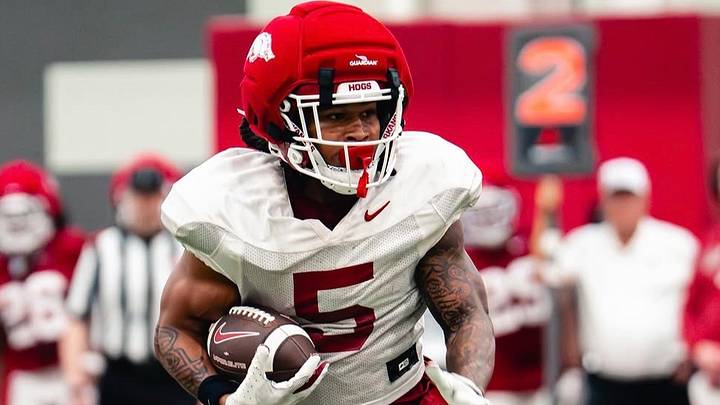 Arkansas Razorbacks running back Sutton Smith looks for running room during spring practice