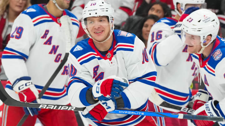 Nov 26, 2025; Raleigh, North Carolina, USA; New York Rangers left wing Artemi Panarin (10) smiles after scoring a goal against the Carolina Hurricanes during the second period at Lenovo Center. Mandatory Credit: James Guillory-Imagn Images
