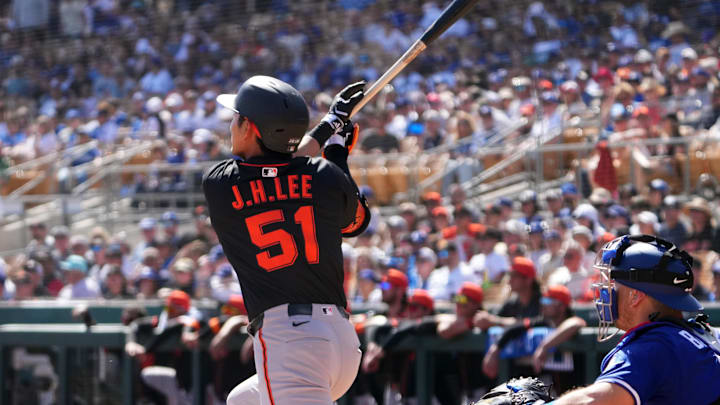 Mar 1, 2025; Phoenix, Arizona, USA; San Francisco Giants outfielder Jung Hoo Lee (51) hits against the Los Angeles Dodgers during the first inning at Camelback Ranch-Glendale. Mar 1, 2025; Phoenix, Arizona, USA; San Francisco Giants outfielder Jung Hoo Lee (51) hits against the Los Angeles Dodgers during the first inning at Camelback Ranch-Glendale.