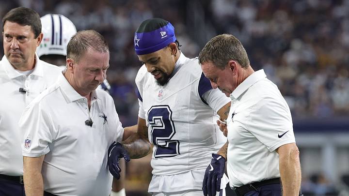 Dallas Cowboys cornerback Cobie Durant walks off the field with an injury against the Washington Commanders at AT&T Stadium. Dallas Cowboys cornerback Cobie Durant walks off the field with an injury against the Washington Commanders at AT&T Stadium.