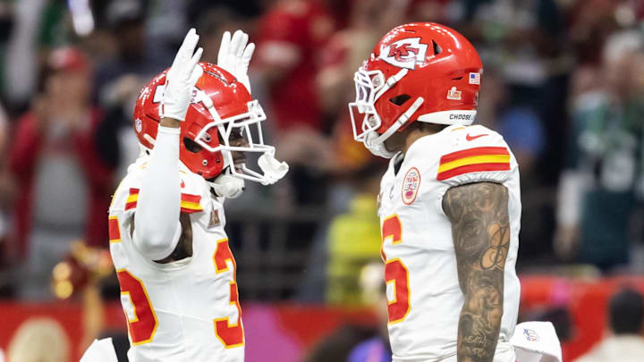 Feb 9, 2025; New Orleans, LA, USA;  Kansas City Chiefs safety Bryan Cook (6) celebrates with teammates Jaylen Watson (35) and Trent McDuffie (22) after an interception against the Philadelphia Eagles in the second quarter in Super Bowl LIX at Ceasars Superdome. Mandatory Credit: Mark J. Rebilas-Imagn Images