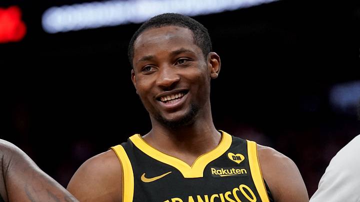 Mar 6, 2024; San Francisco, California, USA; Golden State Warriors forward Jonathan Kuminga (00) smiles after the Warriors made a basket against the Milwaukee Bucks in the fourth quarter at the Chase Center. Mandatory Credit: Cary Edmondson-USA TODAY Sports