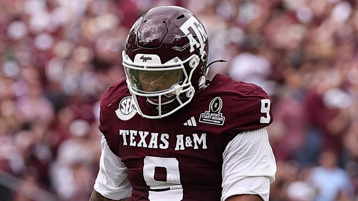 Dec 20, 2025; College Station, TX, USA; Texas A&M Aggies defensive end Cashius Howell (9) reacts during first half of the first round game of the CFP National Playoff against the Miami Hurricanes at Kyle Field. Mandatory Credit: Maria Lysaker-Imagn Images