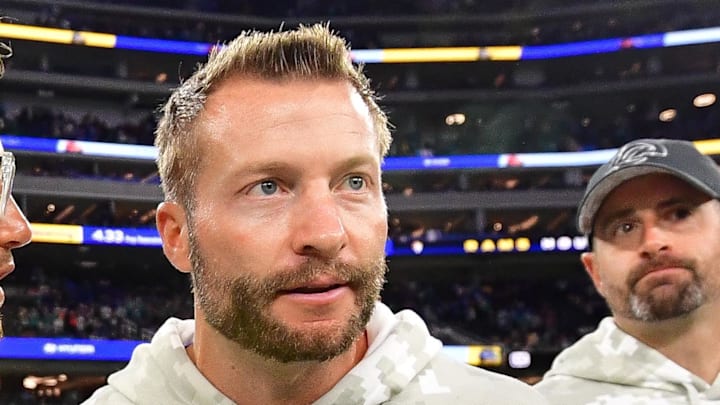 Nov 11, 2024; Inglewood, California, USA; Miami Dolphins head coach Mike McDaniel meets with Los Angeles Rams head coach Sean McVay following the game at SoFi Stadium. Mandatory Credit: Gary A. Vasquez-Imagn Images