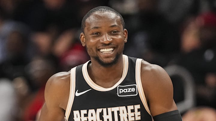 Hawks forward Jonathan Kuminga (0) reacts after making a three point shot against the Washington Wizards. Hawks forward Jonathan Kuminga (0) reacts after making a three point shot against the Washington Wizards.
