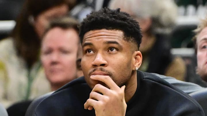 Milwaukee Bucks forward Giannis Antetokounmpo looks on from the bench. Milwaukee Bucks forward Giannis Antetokounmpo looks on from the bench.