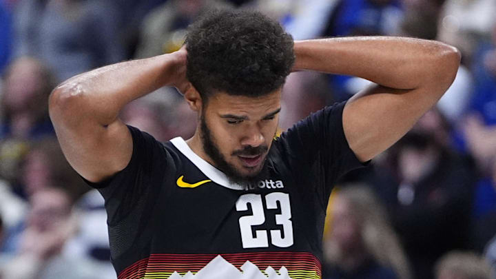 Nov 17, 2025; Denver, Colorado, USA; Denver Nuggets forward Cam Johnson (23) reacts in the fourth quarter against the Chicago Bulls at Ball Arena.