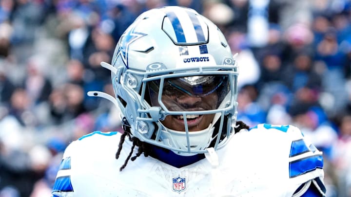 Dallas Cowboys running back Jaydon Blue (23) celebrates after scoring the first touchdown of the game, Sunday, January 4, 2026, in East Rutherford.