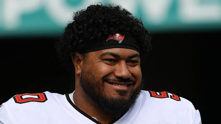 Dec 28, 2025; Miami Gardens, Florida, USA; Tampa Bay Buccaneers defensive tackle Vita Vea (50) walks out for player introductions prior to a game against the Miami Dolphins at Hard Rock Stadium. Mandatory Credit: Nathan Ray Seebeck-Imagn Images